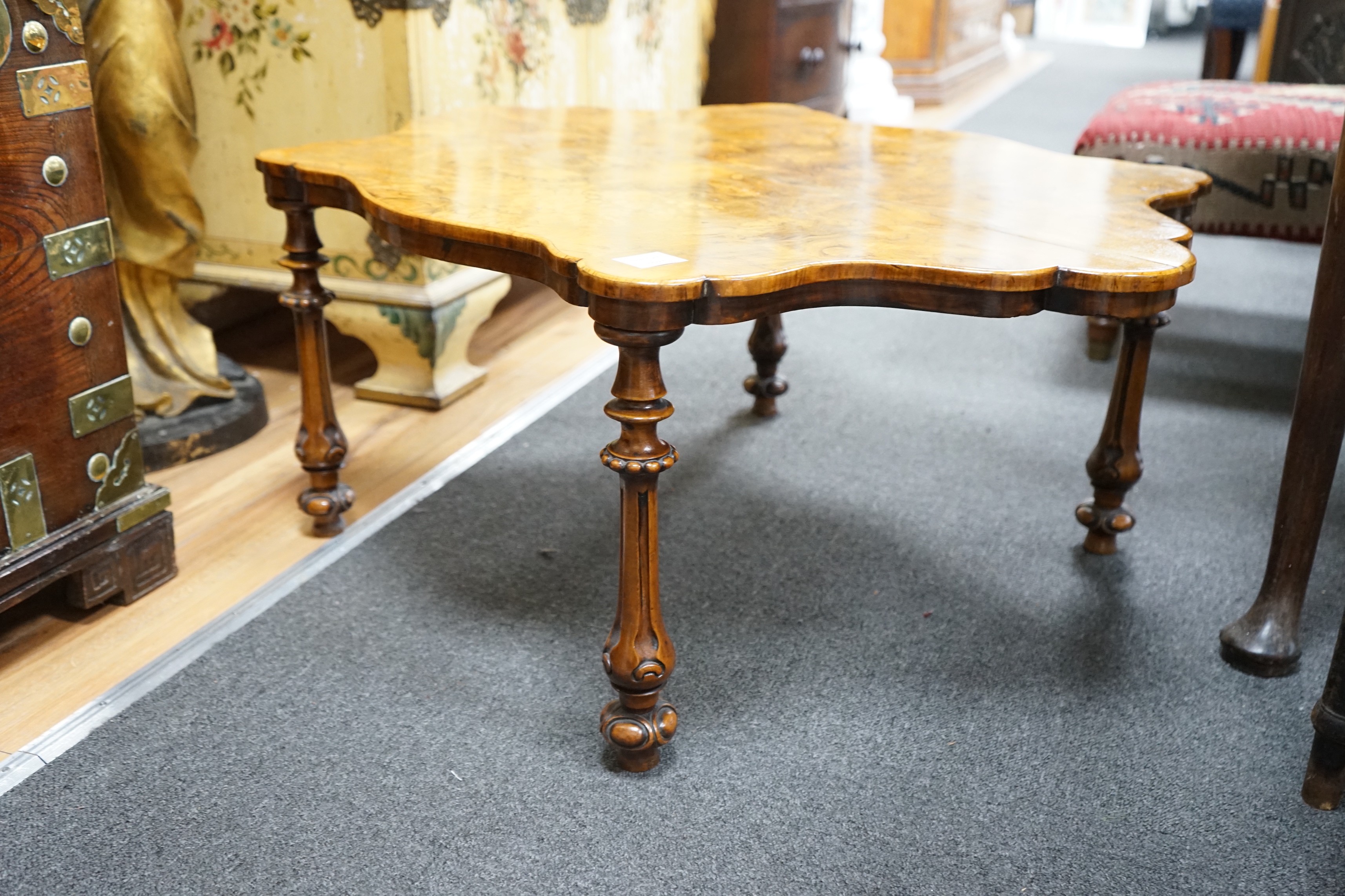 A Victorian burr walnut quarter veneered occasional table, width 93cm depth 70cm height 38cm